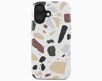 May include: A phone case featuring a white background with a multi-colored terrazzo pattern consisting of scattered shapes in shades of black, dark green, brown, light gray, and beige. The case has a black camera cutout and the text BOHO Case studio.