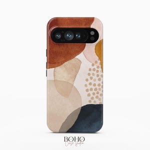 May include: A smartphone case featuring an abstract watercolor design with overlapping shapes in shades of terracotta, beige, mustard yellow, and dark navy blue, accented by a pattern of small tan dots on a light cream background.
