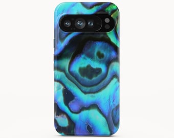 May include: A smartphone case featuring a vibrant, iridescent abalone shell pattern with swirling shades of deep blue, turquoise, and hints of green. The case has a black camera module cutout at the top, showcasing a multi-lens array and flash.