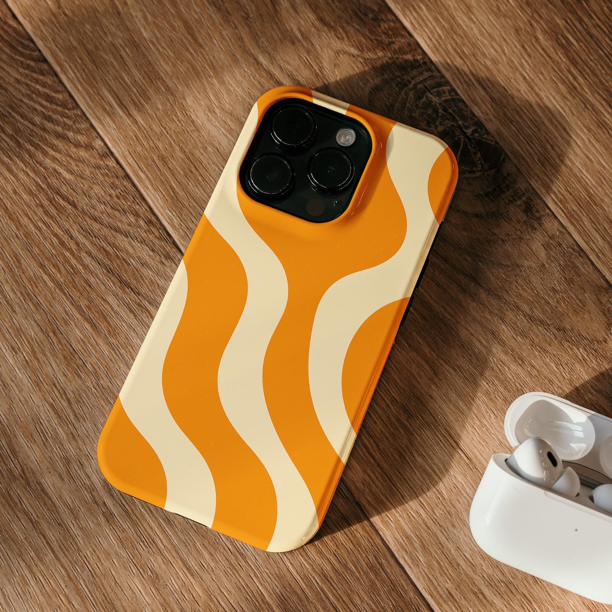 オレンジウェーブアブストラクトiPhoneケース | グルーヴィーなレトロ
