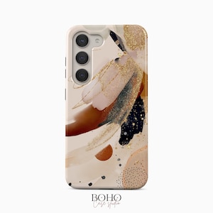 May include: A smartphone case featuring an abstract design with beige, brown, black, and gold glitter brushstrokes. The case has a triple camera cutout on the top left and the text "BOHO Case studio" printed at the bottom center.