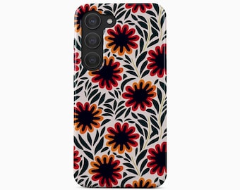 May include: A rectangular smartphone case featuring a repeating floral pattern on a light background. The design consists of stylized flowers with dark centers, orange and red petals, and dark green leaves. The text BOHO Case studio is visible.