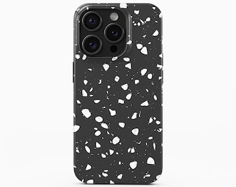 May include: A dark gray smartphone case featuring a white terrazzo pattern with scattered irregular shapes. The case has a cutout for a triple-lens camera system on the back. The text "BOHO Case studio" is printed in black below the phone case.