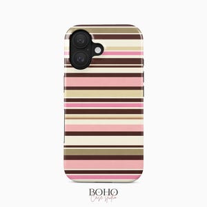 May include: A mobile phone case featuring a horizontal striped design in pink, brown, beige, and white. The case has a camera aperture and the text "BOHO Case Studio" at the base.