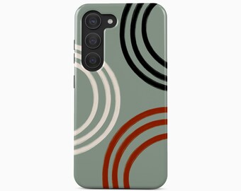 May include: A sage green smartphone case featuring a series of concentric circular lines in black, white, and terracotta red. The case has a cutout for a triple-lens camera system on the upper left side and the text Boho Case studio at the bottom.