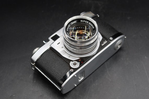 Minolta Super A Rangefinder Film Camera With 50mm F/1.8 Lens