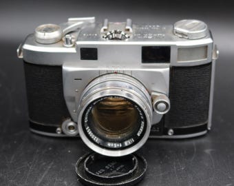 Minolta Super A Rangefinder Film Camera With 50mm F/1.8 Lens