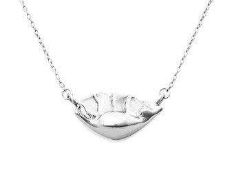 Gyoza Necklace (Sterling Silver) by Delicacies Jewelry - Every purchase donates to fight hunger.