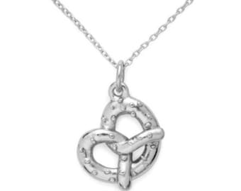 Pretzel necklace, sterling silver by Delicacies Jewelry. Every purchase fights hunger. Gifts for her.