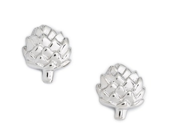 May include: A pair of silver artichoke stud earrings. The earrings are small and delicate, and they feature a realistic artichoke design.