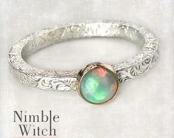 Opal ring in sterling silver and gold mixed metals. October birthstone gift with stackable rings. Engagement rings. Custom made to size.