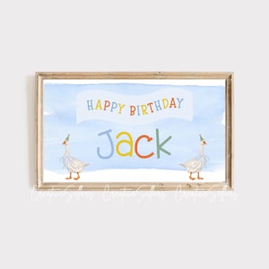 May include: A blue and white watercolor birthday banner with the text "Happy Birthday Jack" and two white geese wearing party hats.