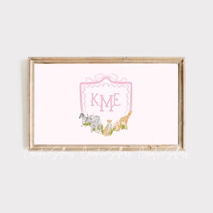 May include: A pink and white framed print with the monogram "KME" in pink letters. The frame is decorated with a pink ribbon and surrounded by a group of animals including a zebra, elephant, giraffe, and a small bear.