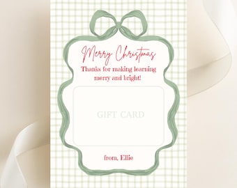May include: A Christmas-themed gift card with a green and white plaid background. The card features a green decorative border with the words "Merry Christmas" in red script. The text "Thanks for making learning merry and bright!" is also included.