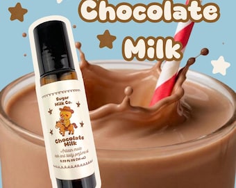 May include: A roll-on perfume bottle with a black cap and a label featuring a cartoon cowboy riding a horse, with the words "Chocolate Milk." The background shows a glass of chocolate milk with a red and white striped straw.