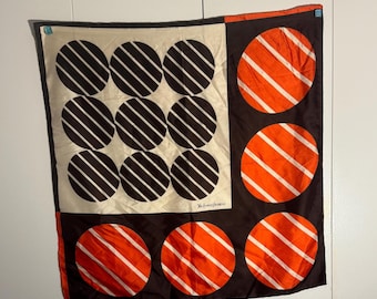 Bufanda vintage de Yves Saint Laurent — Atrevidos círculos de Op Art — Negro, naranja y marfil — Firmada por YSL