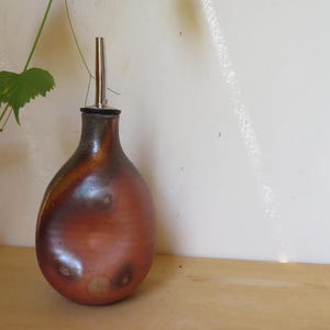 Oil/vinegar dispenser, ceramic olive oil bottle, wood and soda fired pottery