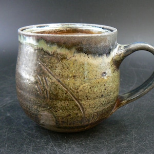 green/brown Ceramic mug, wood and soda fired, 10 oz