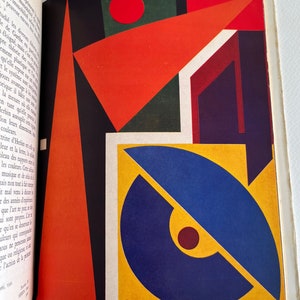 Pode incluir: Impress&atilde;o de arte geom&eacute;trica abstrata com um esquema de cores vermelho, amarelo, azul e preto. A impress&atilde;o &eacute; composta por formas e c&iacute;rculos sobrepostos.