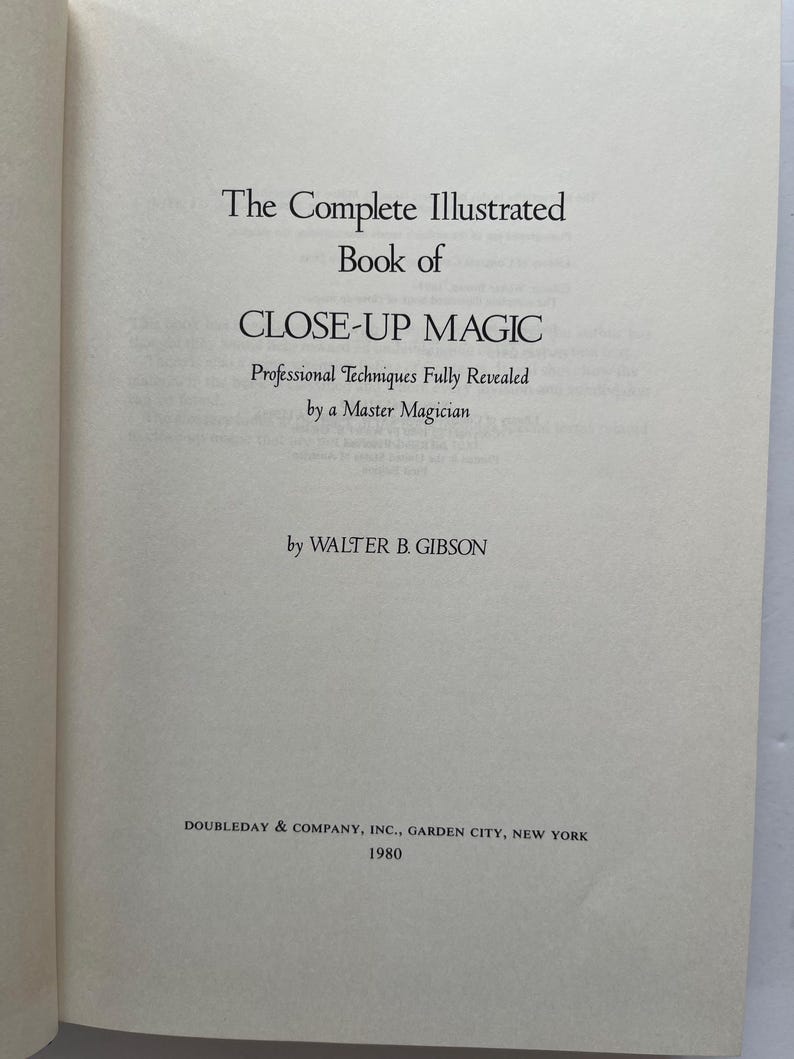 May include: Open book page with text: "The Complete Illustrated Book of CLOSE-UP MAGIC" by Walter B. Gibson. The book's title is in large, bold font. The text "Professional Techniques Fully Revealed by a Master Magician" is also visible. Published in 1980.
