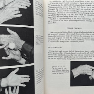 May include: Black and white images from a book on magic tricks. The images show hands manipulating a small white ball. Text describes the steps for various illusions, including color changes and vanishing acts.