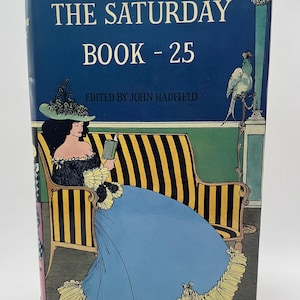 May include: The Saturday Book - 25, edited by John Hadfield, a vintage book cover with an illustration of a woman in a blue dress sitting on a striped couch reading a book. The background is green with a bird perched on a stand.