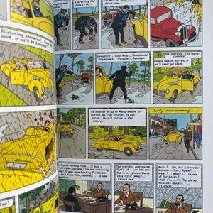 May include: A comic book page featuring a series of panels with illustrations. The panels depict scenes with characters, including a man in a suit and a yellow car. Text bubbles contain dialogue and sound effects.