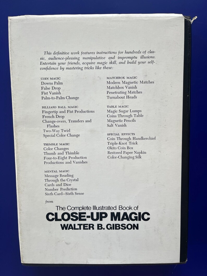 May include: A book cover for "The Complete Illustrated Book of Close-Up Magic" by Walter B. Gibson. The cover features a list of magic tricks, including coin, billiard ball, thimble, and mental magic. The book is white with black text.