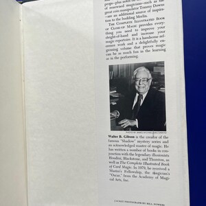 May include: Open book with text and a black and white photo of a man in a suit. The text includes the title "The Complete Illustrated Book of Close-Up Magic" and the author's name, Walter B. Gibson.