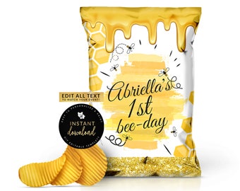 May include: A printable chip bag design with a yellow and white honeycomb pattern, dripping honey, and gold glitter. The text reads "Abriella's 1st bee-day".