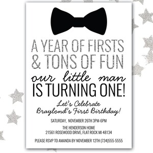 May include: A black and white invitation with silver glitter accents. The invitation says "A Year of Firsts & Tons of Fun our little man is turning one! Let's Celebrate Braylond's First Birthday!" with the date, time, and location below.