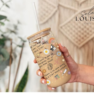 May include: A clear glass tumbler with a bamboo lid and a white straw. The tumbler is decorated with colorful stickers and text, including a rainbow, daisies, and lab-related graphics. The text reads "If You man Me: Sure thing! this STAT."