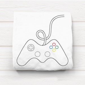 May include: A black and white outline of a video game controller with a cord. The controller has four buttons, a directional pad, and two analog sticks.