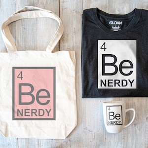 May include: A set of three items featuring a science-themed design with the text "Be Nerdy" and the chemical element symbol for Beryllium. The set includes a tote bag, a t-shirt, and a mug.