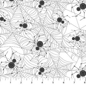 May include: White fabric with a repeating pattern of black spiders and spiderwebs. The spiders are made of black buttons. The webs are drawn with dashed lines. The pattern repeats across the fabric.