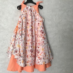 Robe enfant qui tourne ton pêche