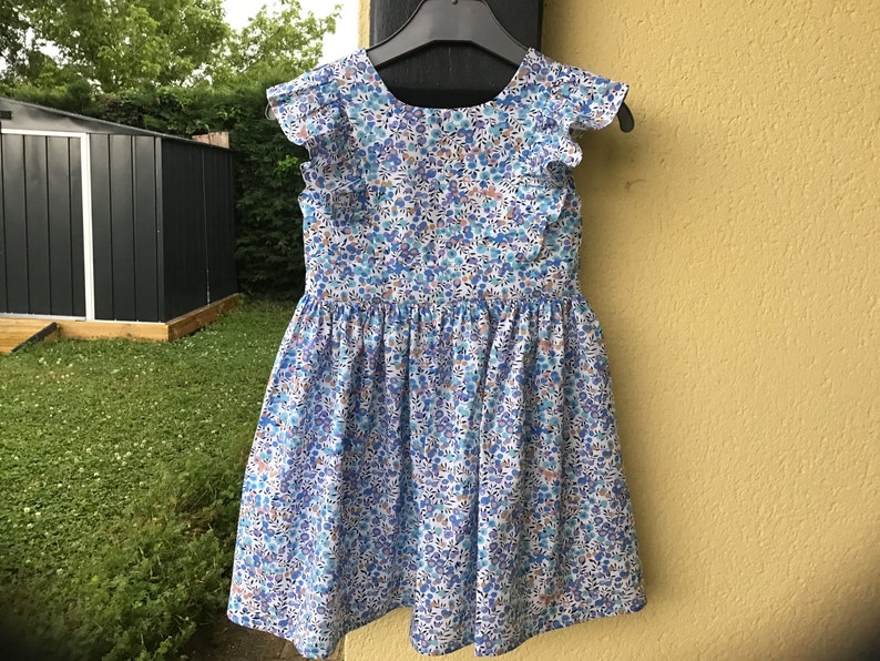 Spring ruffle dress with bare back from 2 to 12 years Blue