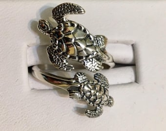 Anillo ajustable de tortugas en plata de ley 937