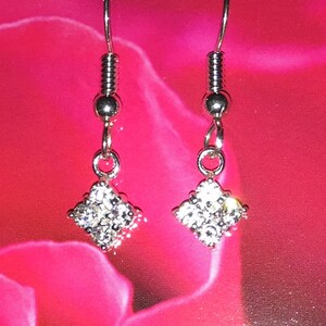 CZ Sterling Silver Earrings          547