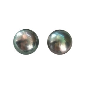 May include: Two round, iridescent grey pearl earrings.