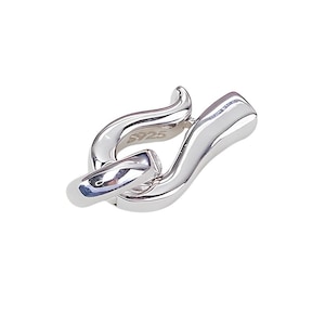 May include: Silver-toned clasp with a wavy design. The clasp is marked with "925" indicating it is made of sterling silver.