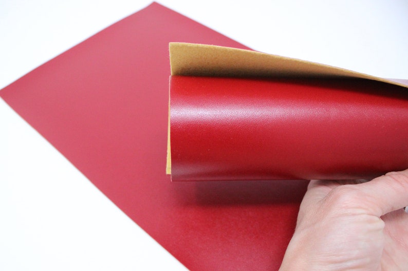 red faux leather jeans