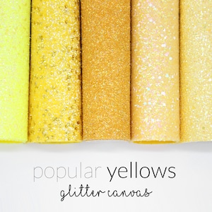 May include: Five rolls of glitter canvas in various shades of yellow, including a bright yellow, a pale yellow, a gold, a shimmery yellow, and a light yellow. The text "popular yellows glitter canvas" is printed below the rolls.