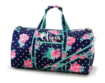 Sac de voyage fleuri avec monogramme
