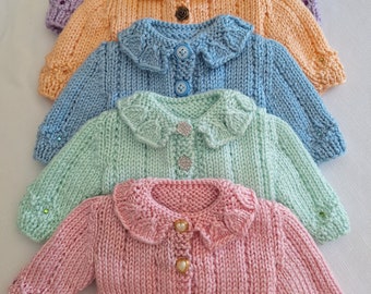 Doll sweater with diamond pattern and embellished with jewels.