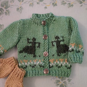 Handknit Doll sweater set with Scandanvian pattern of dancing girls and boys.