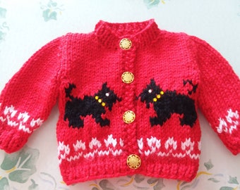 Handknit Doll sweater set with scottie dogs for an 18 inch doll.