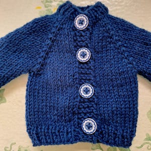 Doll sweaters for 16 inch dolls. Created from Karina's Cozy Sweater Pattern found at PixieFaire.com.