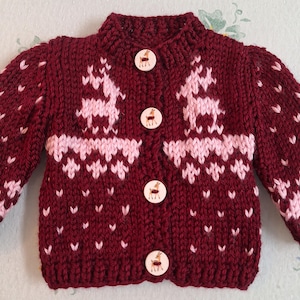 Doll sweater set with a reindeer motif