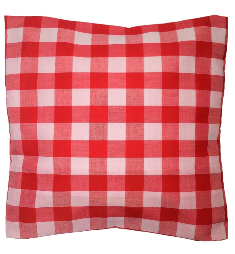 May include: Red and white checkered pillow cover. The pillow cover is made of a soft, cotton fabric and has a square shape.